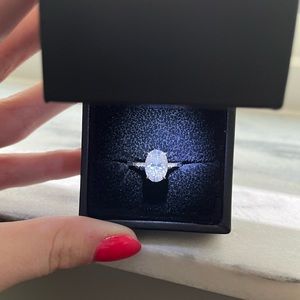 Custom designed diamond and moissanite ring